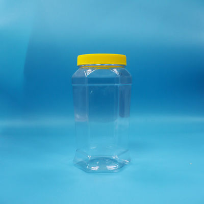 کوکی های درجه غذایی شیرینی شکل هکساگونال شفاف پیت قوطی مواد غذایی کلاه پیچ زرد