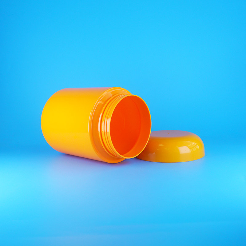 شیشه های پلاستیکی گرد نارنجی رنگ با درب پیچی برای کوکی ها و آب نبات پنبه ای، درب نارنجی