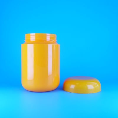 شیشه های کوکی و آب نبات با درپوش تخت پیچی پلاستیکی نارنجی PET با درجه غذایی و شکل گرد